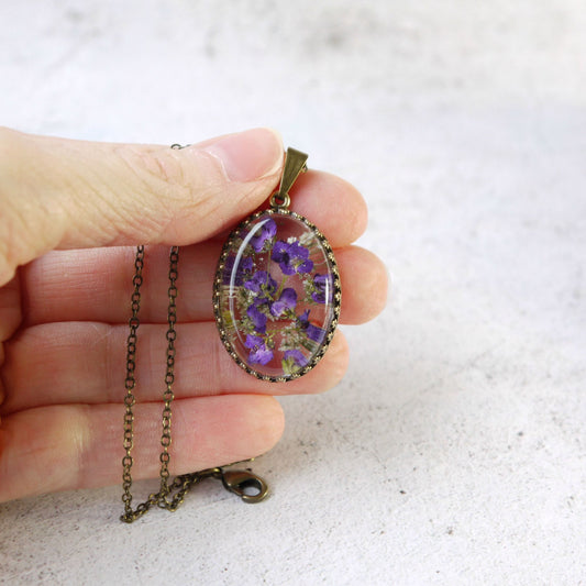 Purple Alyssum Flowers in Resin Pendant Necklace - Antiqued Brass