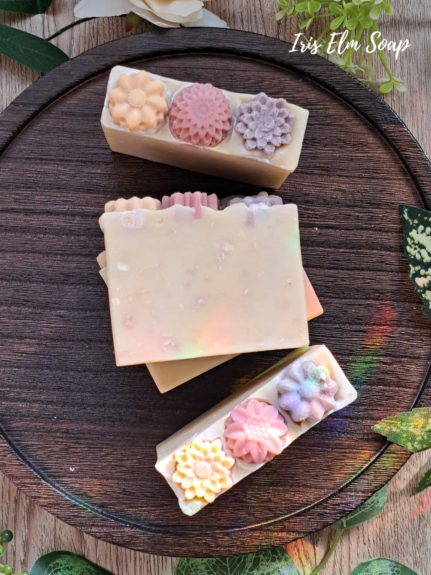 green wildflower meadow handmade cold process soap bars with pink, purple, and yellow soap flowers
