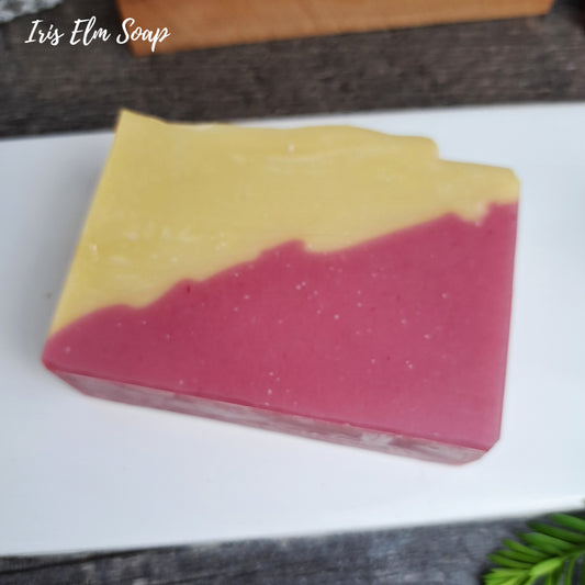a bar of pink and yellow cherry lemonade fruit scent handmade soap bar