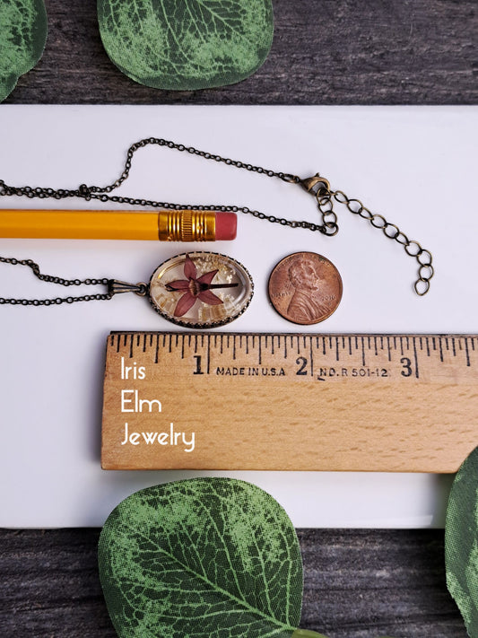 Dark Dusty Pink Pressed Flower in Resin Necklace - Antiqued Brass