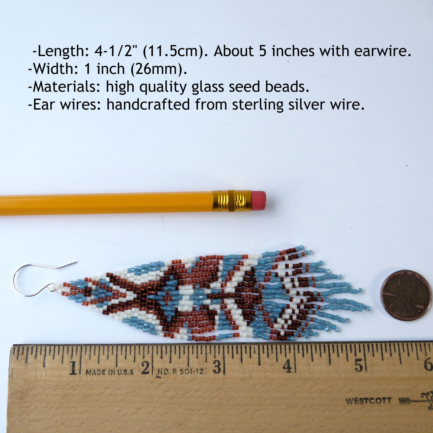 Beaded earring with measurements of 5 inches long and materials listed, next to a pencil and coin for scale.