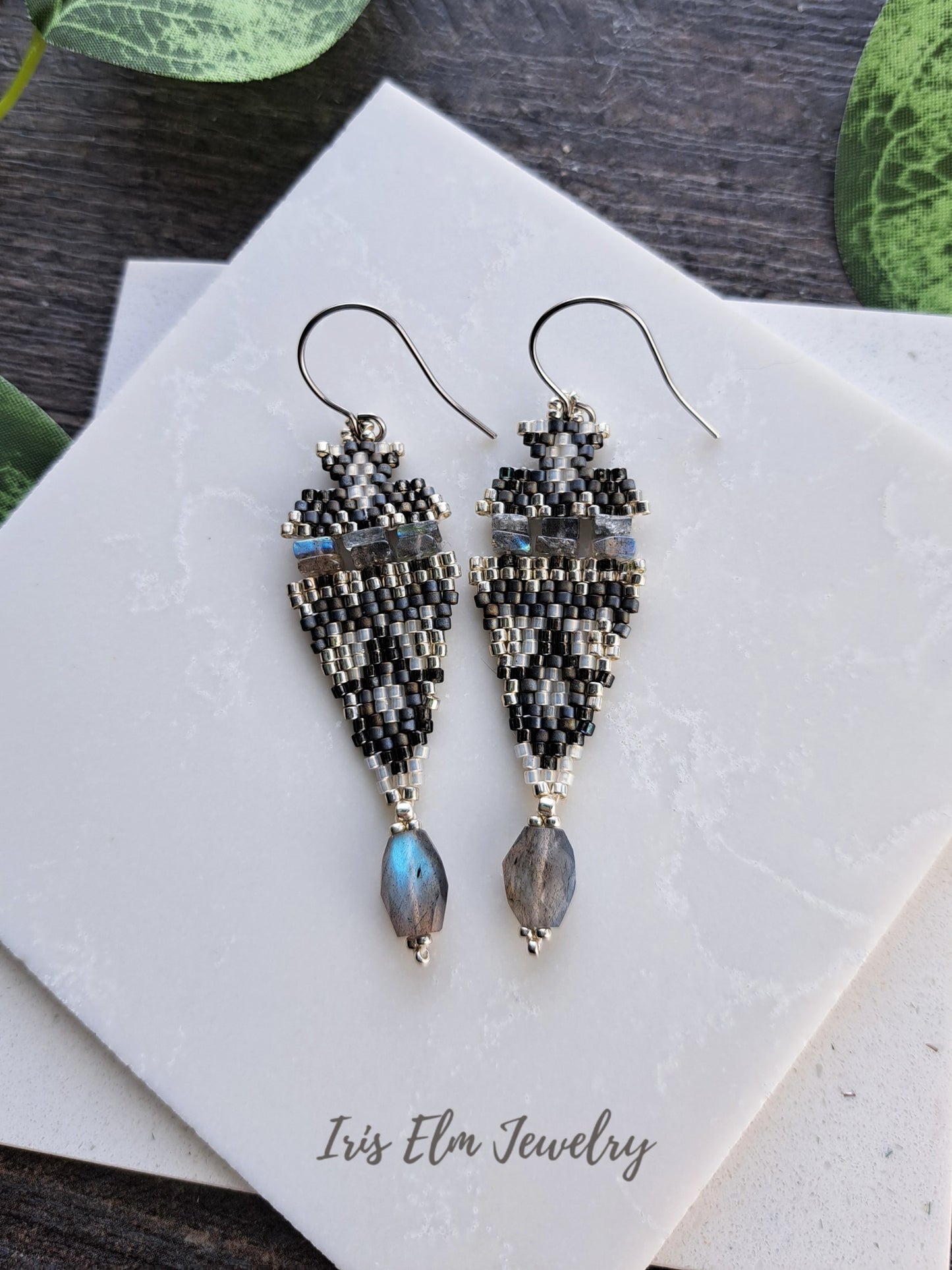 iridescent labradorite stone and seed bead boho beadwork earrings on white tile with Iris Elm Jewelry branding