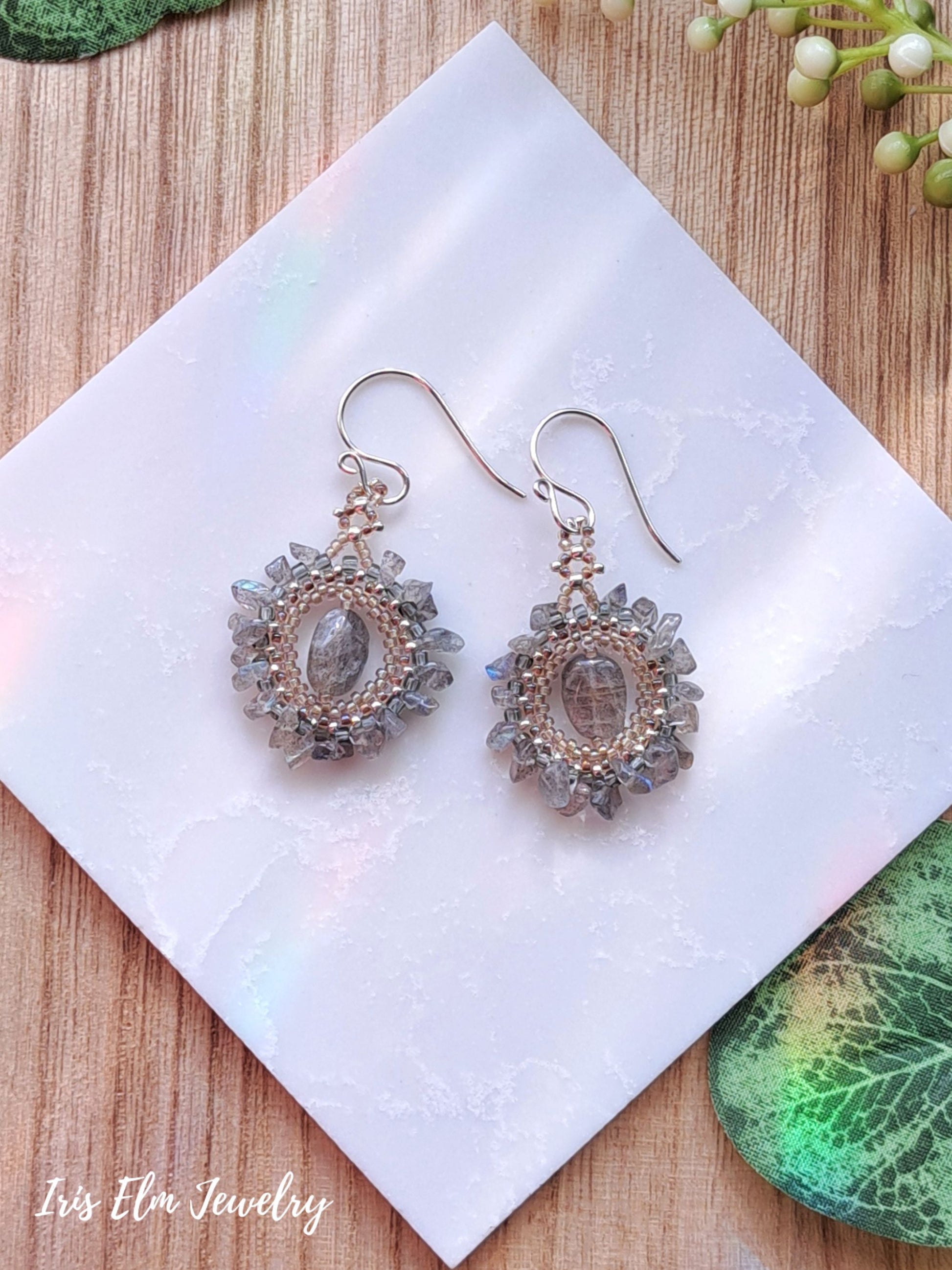 Decorative labradorite beaded boho earrings on a white tile with 'Iris Elm Jewelry' branding.