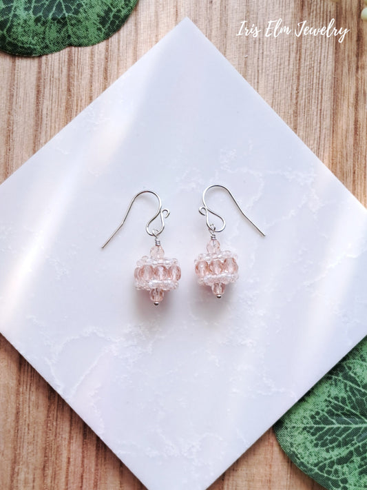 Pair of pink czech glass beaded earrings on a white tile with 'Iris Elm Jewelry' branding.