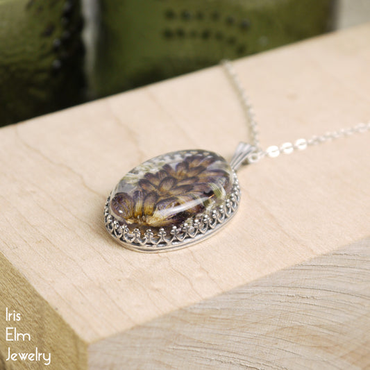 Dark Purple Wildflower in Resin Oval Pendant Necklace - Antiqued Silver Tone