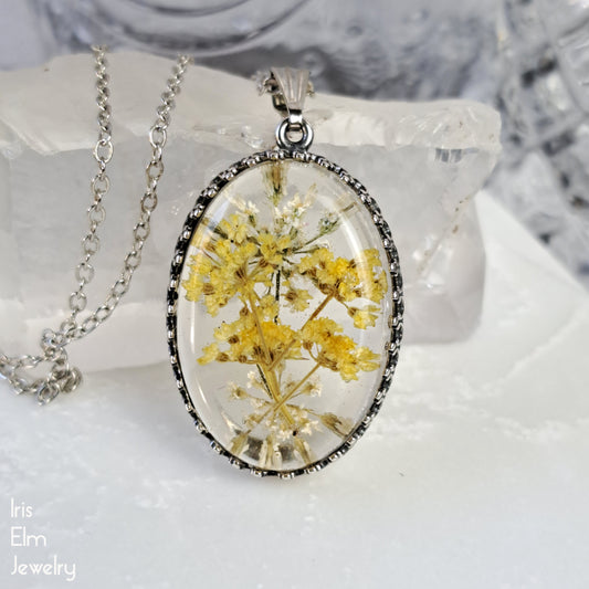 Yellow Minnesota Wildflower in Resin Oval Pendant Necklace - Antiqued Silver Tone