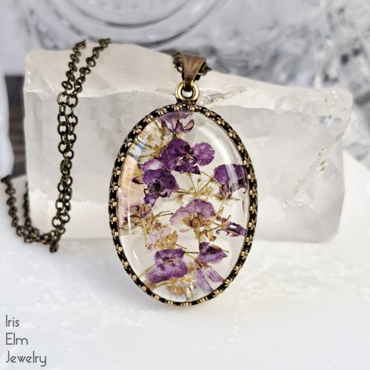 Purple Alyssum Flowers in Resin Pendant Necklace - Antiqued Brass