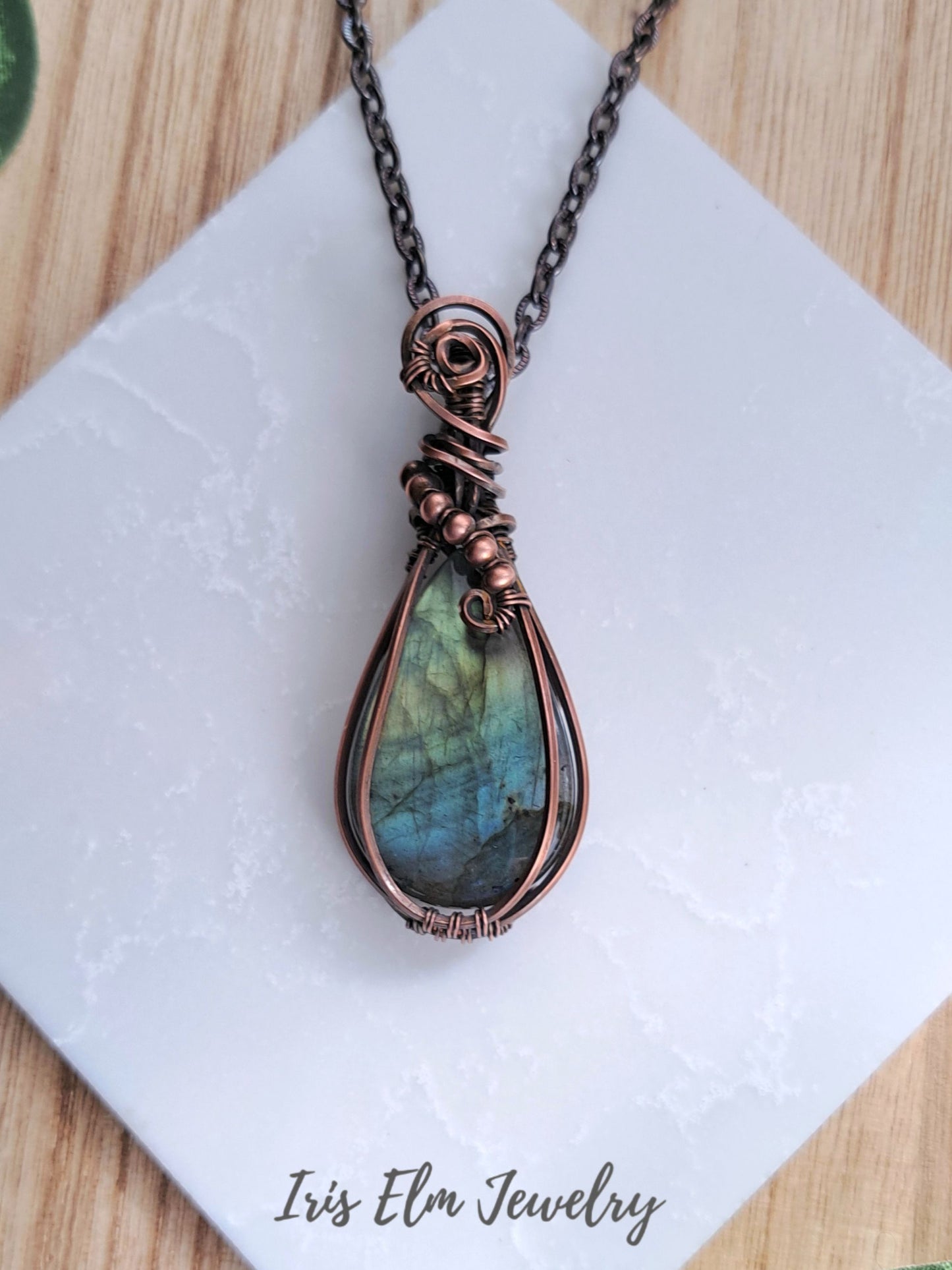 a handcrafted wire wrapped teardrop labradorite gemstone pendant copper necklace